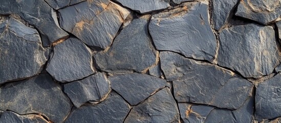 Wall Mural - black slate stone texture background with natural patterns and cracks, ideal for use in various desi