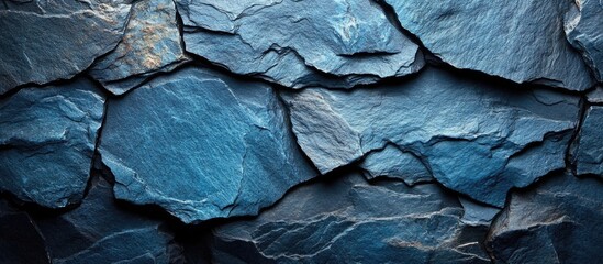 Wall Mural - blue slate stone texture with uneven surfaces and deep shadows ideal for background use copy space