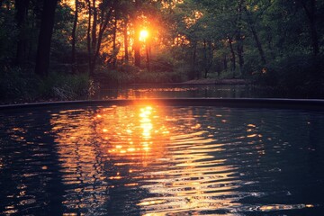 Poster - Sunset reflections over a serene forest river with golden hues and gentle ripples in the water
