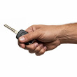 © SOLOTU - Black key of a car in hand isolated on a white background. Car key
