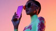 © Konstiantyn Zapylaie - Fashionable hispanic female model with smartphone in vibrant neon setting