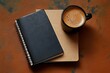 © Ripon - Black and brown notebooks with a cup of coffee