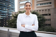© peopleimages.com - Portrait, business and woman with confidence on balcony for corporate career, financial growth and ambition. Smile, person and arms crossed with experience, investment and opportunity as accountant