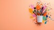 © Giman - Colorful paintbrushes in a container, art supplies, peach background, creative hobby