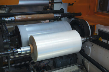 Poster - Industrial machine for production and printing of polyethylene bags. Industrial concept background