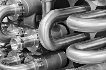 Aufkleber - A close up of a group of metal pipes as industrial background. pipes are silver and have a shiny appearance. Concept of industrial Chemical pharmaceutical device