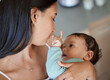 © peopleimages.com - Comfort, mother and bonding with baby in home for connection, child development and cuddle. Love, woman and carrying infant for support, protection and parenting for motherhood, wellness and routine