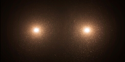 Wall Mural - two bright car lights with particles at night