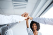 © peopleimages.com - Office, business people and celebrate with high five for motivation, team building and support for project. Goals, employees and hands of accountant for agreement, solidarity and investment success