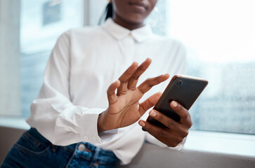 Office, window and black woman with smartphone for chat, online communication and text for contact. Hands, female designer and scroll with mobile for message, application and digital on social media