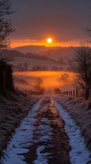 Wall Mural - Snowy Path at Sunset Over Misty Hills