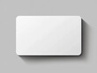 © khozainuz - Minimalist white blank gift card mockup with subtle shadow on a gray background