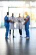 © SunriseDon/peopleimages.com - Blur, healthcare and teamwork with doctors in hospital for medical, support and solidarity. Nurse, meeting and wellness with group of people in clinic for diversity, collaboration or consulting