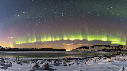 Aurora borealis above mountains in fog at night. Northern lights. Sky with stars with polar lights and high rocks. Beautiful landscape with aurora, city lights in low clouds, mountain ridge. Space
