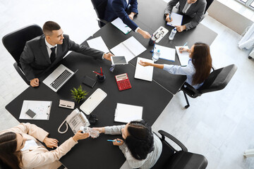 Sticker - Group of business people working at table in conference hall, top view