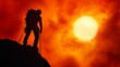 © Lush Diaries - Silhouette of a male climber atop a mountain, fiery sunset behind.