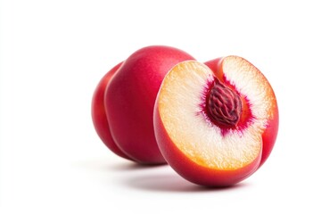 Wall Mural - A fresh peach cut in half, with a slice removed for eating or serving