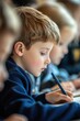 © felix_brönnimann - Children, focused on writing during a classroom lesson, engaging in education and learning activities to enhance their skills and knowledge development.