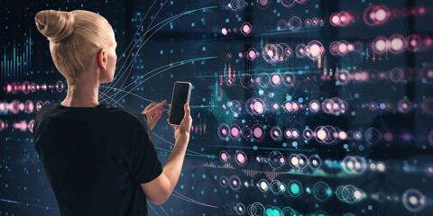 Poster - Woman holding smartphone while interacting with digital holographic interface in dark futuristic space.