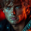 © Bussakon - Dramatic headshot portrait of a creative musician holding guitar neck close to face with moody stage lighting and bokeh effect