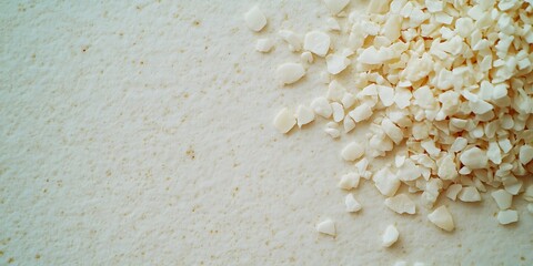 Poster - Close-up of textured cream surface with scattered white granules