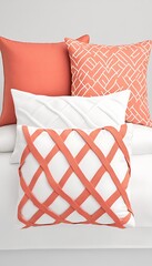 Canvas Print - Decorative pillows in coral and white arranged on a neutral background