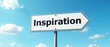 © robfolio - Directional Road Sign with 'Inspiration' Against Blue Sky with Clouds