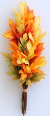 Wall Mural - Vibrant autumn floral arrangement with colorful leaves on display