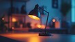 © HENNYSURYA - Desk lamp illuminates cozy home office at night