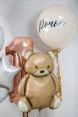 Wall Mural - beige balloons for 1 year old, teddy bear balloon, foil number, inscription on the balloon 