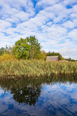 Wall Mural - Bootshäuser und Schilf am Krakower See in der Stadt Krakau am See