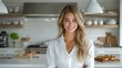 © tonpreecha - A warm, inviting kitchen atmosphere with a smiling blonde woman, clean white cabinets, fresh pastries, and natural light emphasizing the cozy and elegant vibe. Ultra-Realistic, Photo Realistic,