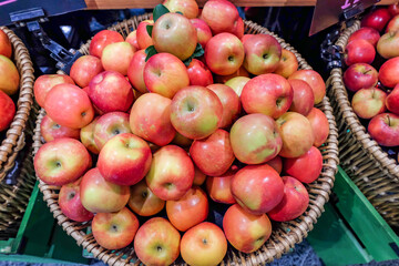 Wall Mural - Fresh red apples in wooden basket ,sweet fruit.