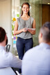 © peopleimages.com - Woman, meeting and presentation in office, business workshop and speak to coworkers in boardroom. Briefing, team training and professional explaining news story in workplace, journalist and talking
