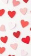 © NeuroCake - Red and pink paper hearts pattern on white background. Love and romance concept. Design for greeting card and  Valentine's Day festive banner with copy space.