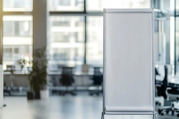 Canvas Print - A blank roll-up banner standing in an office setting, symbolizing the potential for advertising and public discovery through digital marketing techniques. White background