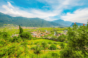 Wall Mural - Arco castle ruins on cliffs above Garda lake, Trentino, Italy. Lago di garda