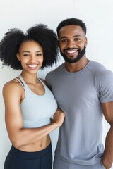 Poster - A man and a woman are smiling for the camera. The woman is wearing a grey tank top and the man is wearing a grey shirt. They seem to be happy and enjoying each other's company