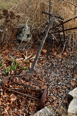 Poster - Antique Lawn Mower in a Garden