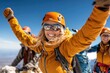 © Konstiantyn Zapylaie - Female adventure enthusiast reaches mountain summit with friends