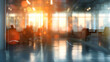 © rizkan - A blurred office interior illuminated by sunset, creating a warm and inviting atmosphere.