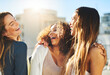 © peopleimages.com - Laughing, youth and smile with friends in city for bonding, funny and spring break. Students, summer vacation and college freshman with women in new york for solidarity, support and lens flare