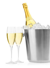 Wall Mural - Champagne in glasses and ice bucket with bottle isolated on white