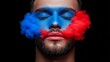 © NAPHAT - Blue & Red Color:  A captivating portrait of a young man with his face painted in a mesmerizing blend of blue and red. Clouds of color seemingly flow from his cheeks.