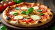 © Mali - Aromatic pizza with melted mozzarella cheese, ripe tomato slices, and fresh basil leaves, presented on a rustic wooden board