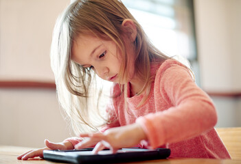 kid, student and play with tablet in classroom streaming lesson, elearning website and drawing app. 