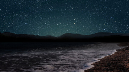 Wall Mural - a movement of stars in the night sky with the view of mountains..