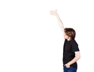 Poster - Casual man wearingshirt and jeans, raising arm high, isolated on white background, concept of reaching or pointing upwards