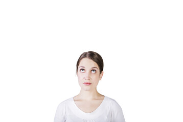 Poster - Closeup of a woman with a curious expression looking up, wearing a white shirt, isolated on a plain white background. Concept of curiosity