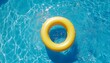 © Ilja - Yellow Inflatable Pool Ring Floating in Clear Blue Swimming Pool Water, Summer Background